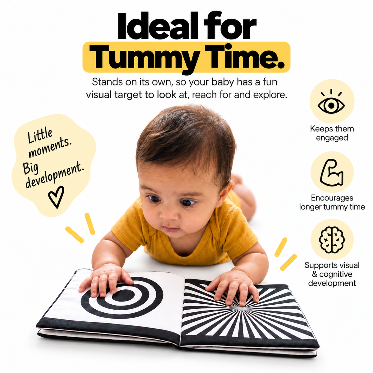 Baby using a high contrast cloth book during tummy time as a visual target