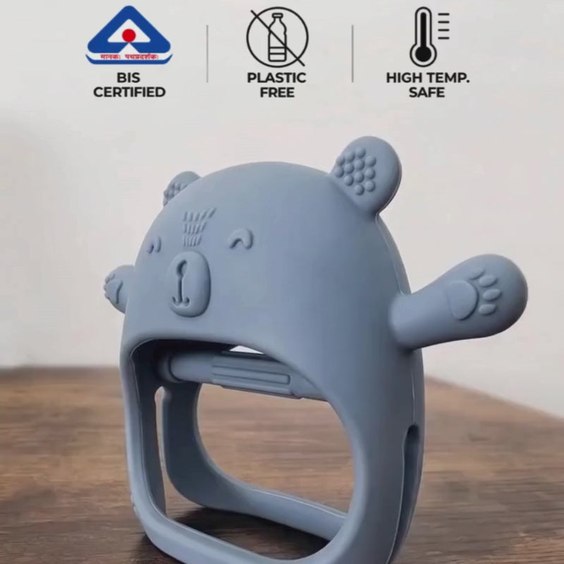 Kiko No-Drop newborn teether in use, a BIS certified silicone baby teether worn on the wrist so it does not fall