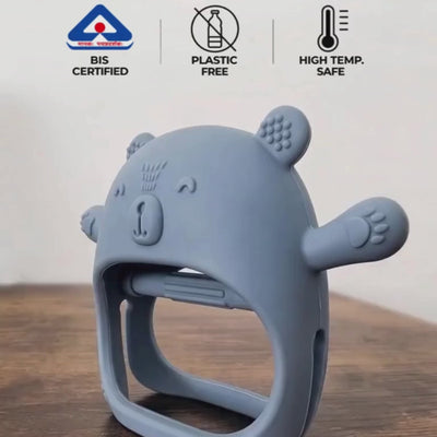 Kiko No-Drop newborn teether in use, a BIS certified silicone baby teether worn on the wrist so it does not fall